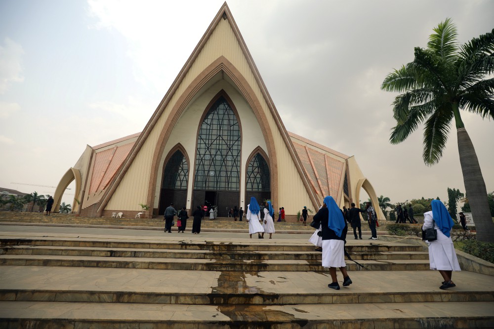 Nuns enter a church in Abuja, Nigeria, ahead of a protest over unending killings of Nigerians March 1. (CNS/Reuters/Afolabi Sotunde) Nuns enter a church in Abuja, Nigeria, ahead of a protest over unending killings of Nigerians March 1. (CNS/Reuters/Afolabi Sotunde)