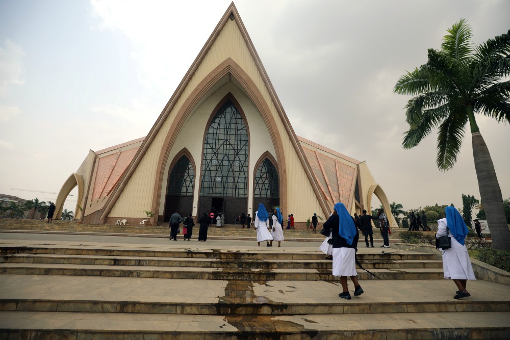 Nuns enter a church in Abuja, Nigeria, ahead of a protest over unending killings of Nigerians March 1. (CNS/Reuters/Afolabi Sotunde)