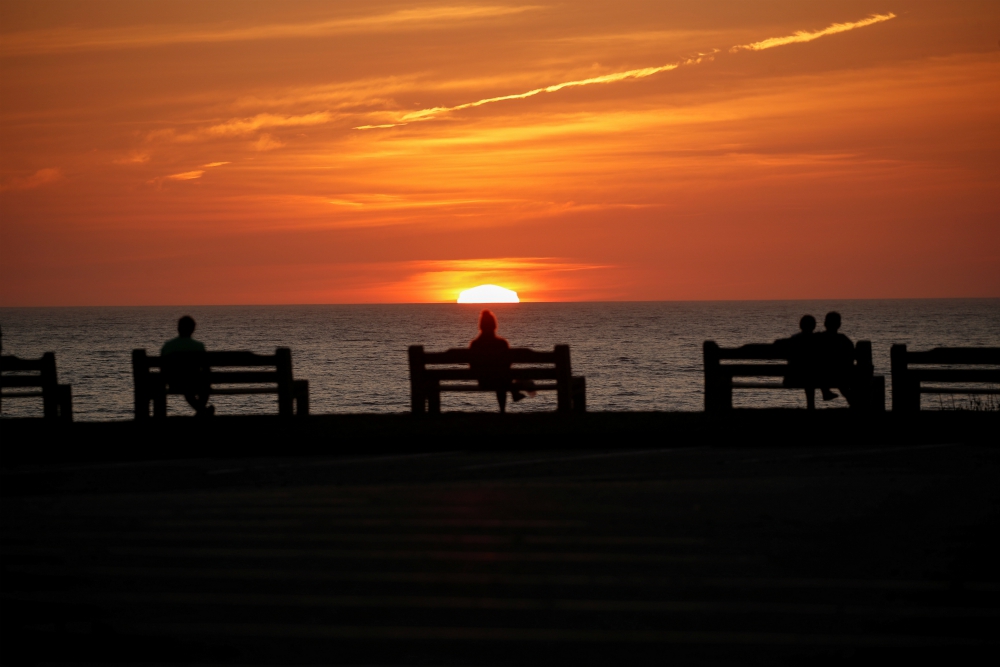 People in Encinitas, California, practice social distancing during the coronavirus pandemic March 30. (CNS/Reuters/Mike Blake) People in Encinitas, California, practice social distancing during the coronavirus pandemic March 30. (CNS/Reuters/Mike Blake)