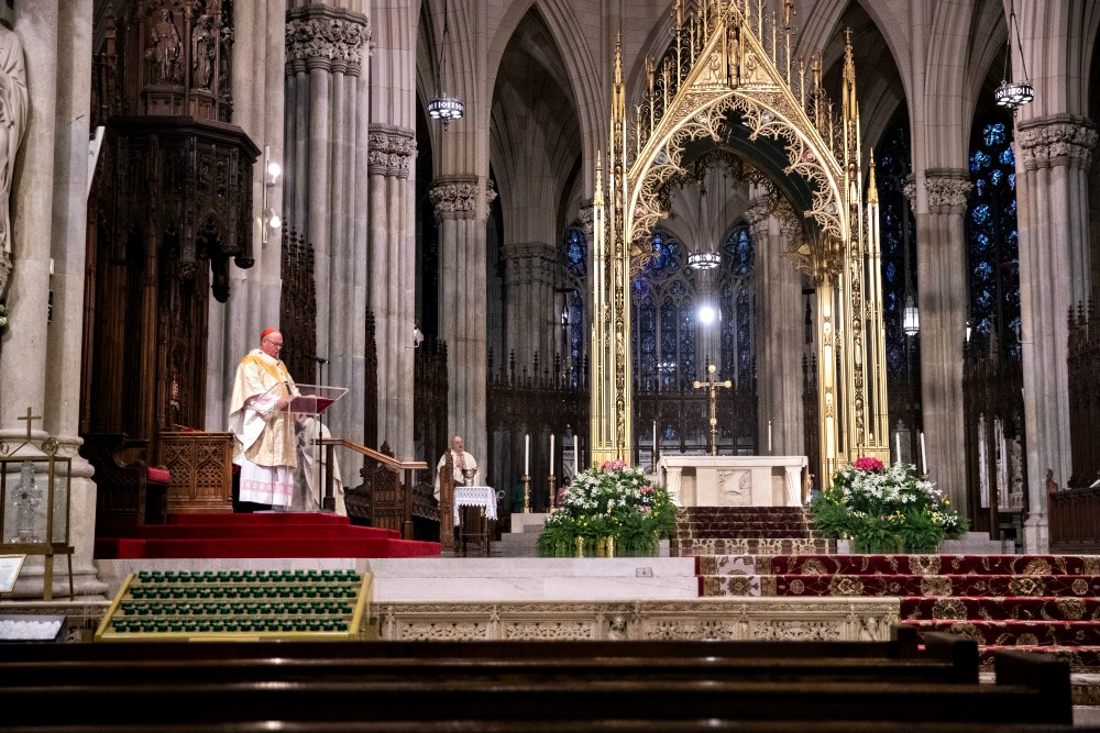 New York Cardinal Timothy Dolan celebrates Easter Mass at St. Patrick's Cathedral April 12 during the coronavirus pandemic. (CNS/Reuters/Jeenah Moon)