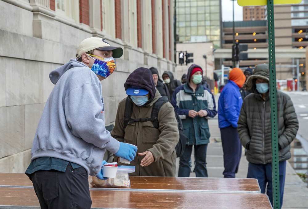 Homeless people in Detroit get hot meals and other help at the Pope Francis Center May 1. (CNS/Jim West)