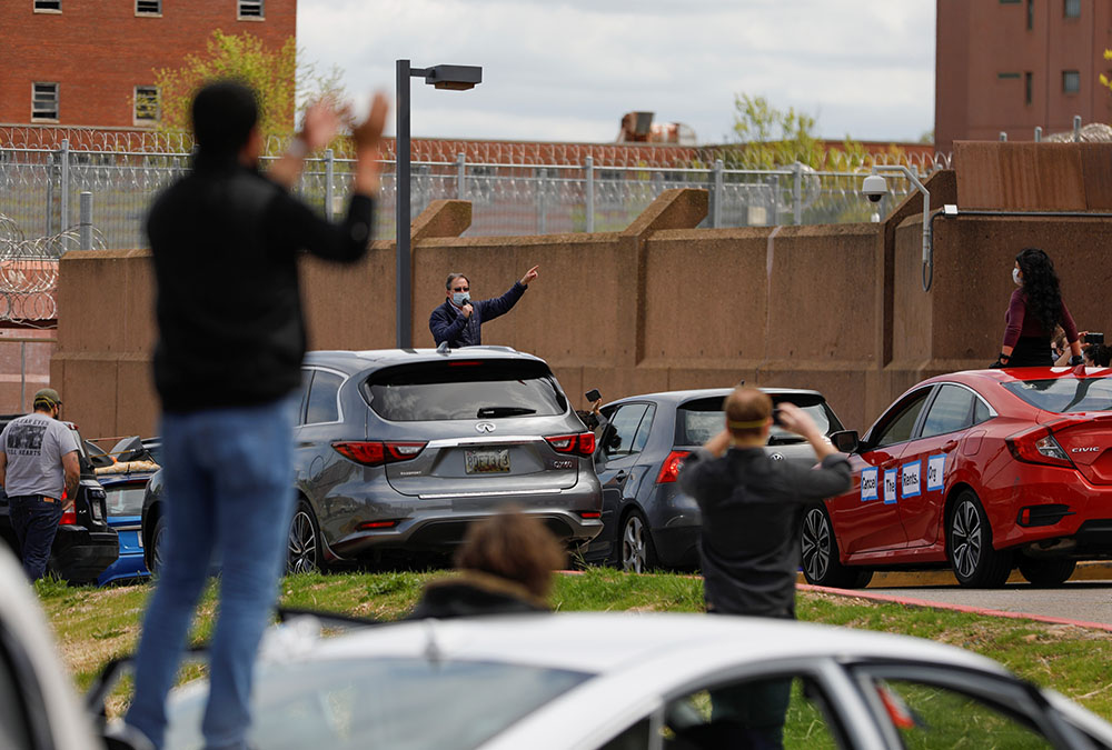 Demonstrators in the District of Columbia stage a motorized protest outside the Correctional Treatment Facility against sanitary conditions inside prisons April 25, 2020. (CNS/Reuters/Tom Brenner)