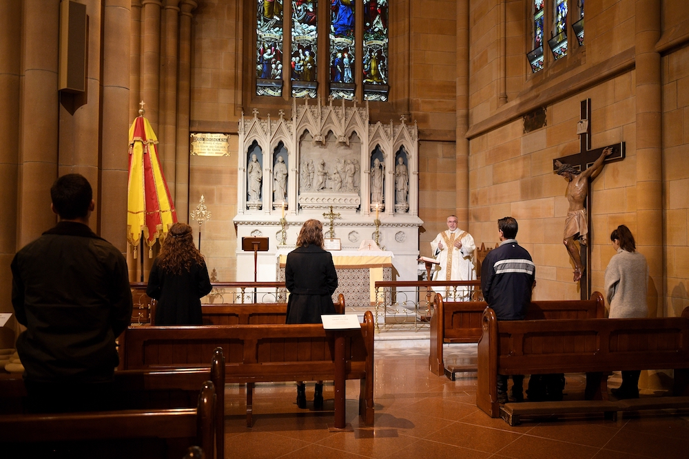 People attend Mass at St Mary's Cathedral in Sydney May 15, 2020, during the COVID-19 pandemic. (CNS/Dan Himbrechts, AAP Image via Reuters) 