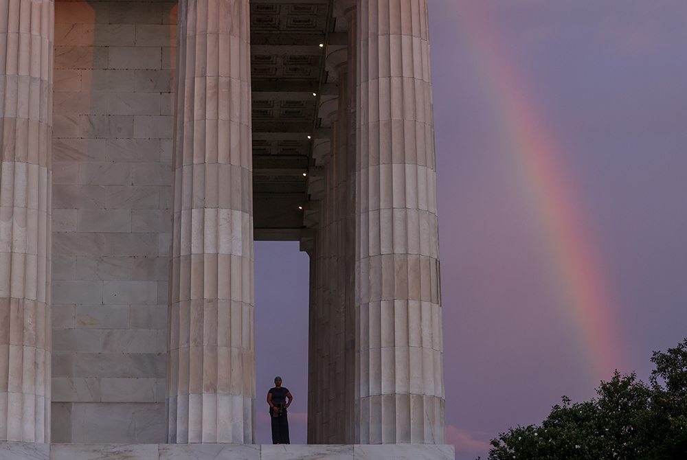 A rainbow appears behind the Lincoln Memorial in Washington June 19, 2020. The date, known as Juneteenth, honors the end to slavery in the United States and is considered the longest-running African American holiday. (CNS/Jonathan Ernst, Reuters)