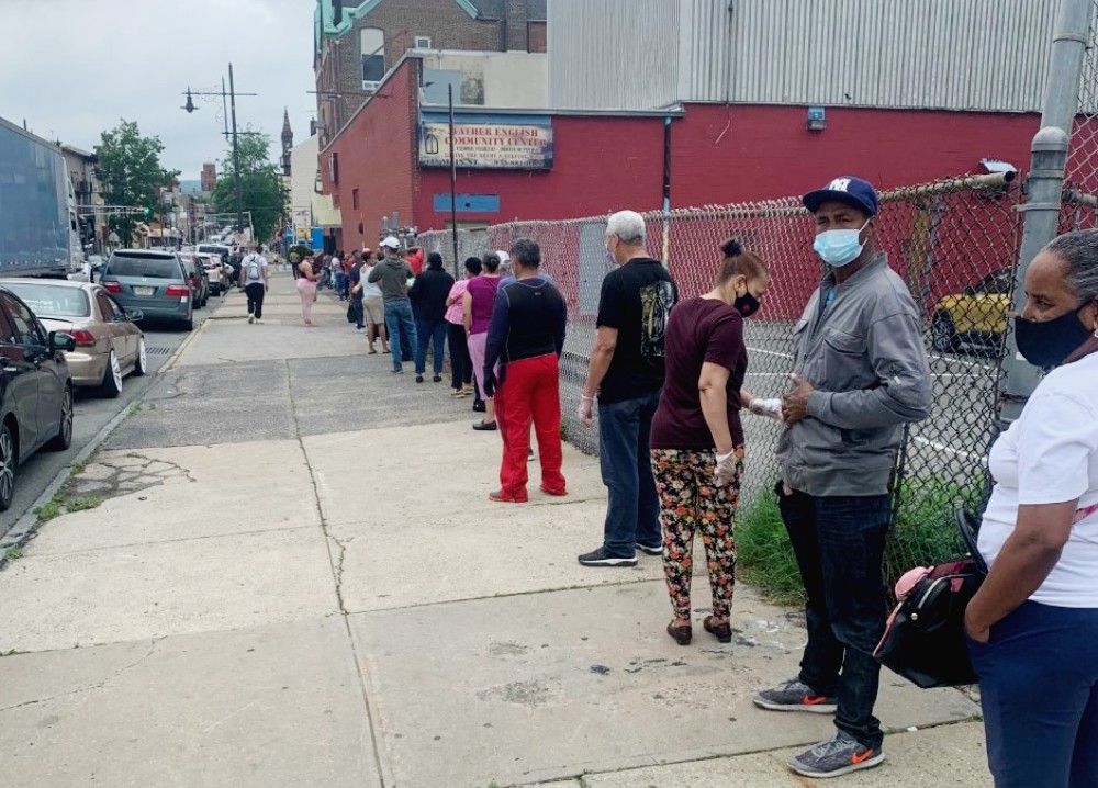 The line outside of the Fr. English Food Pantry in Paterson, New Jersey, stretches through several city blocks June 8 for people seeking food assistance from the program run by Catholic Charities of the Paterson Diocese. (CNS)