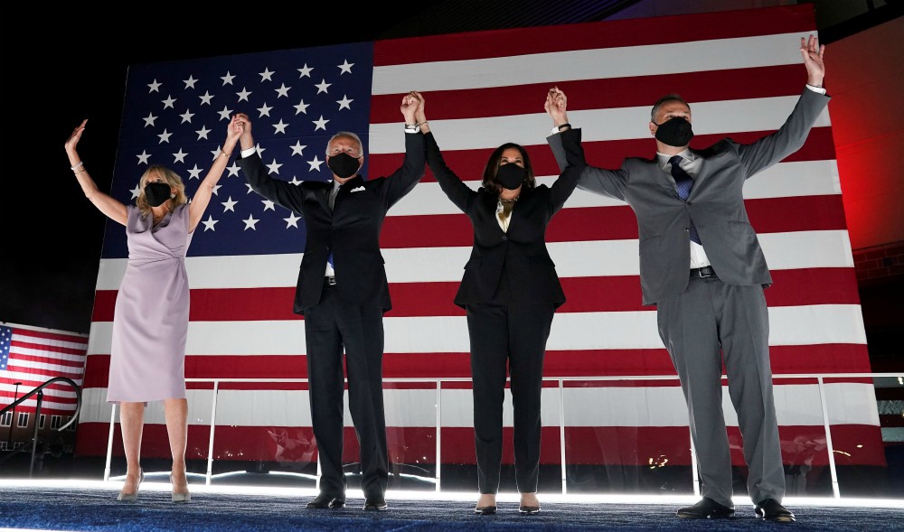 Democratic presidential candidate Joe Biden and vice presidential candidate Kamala Harris, center, celebrate with their spouses in Wilmington, Delaware, Aug. 20, after Biden accepted the Democratic presidential nomination. (CNS/Reuters/Kevin Lamarque)