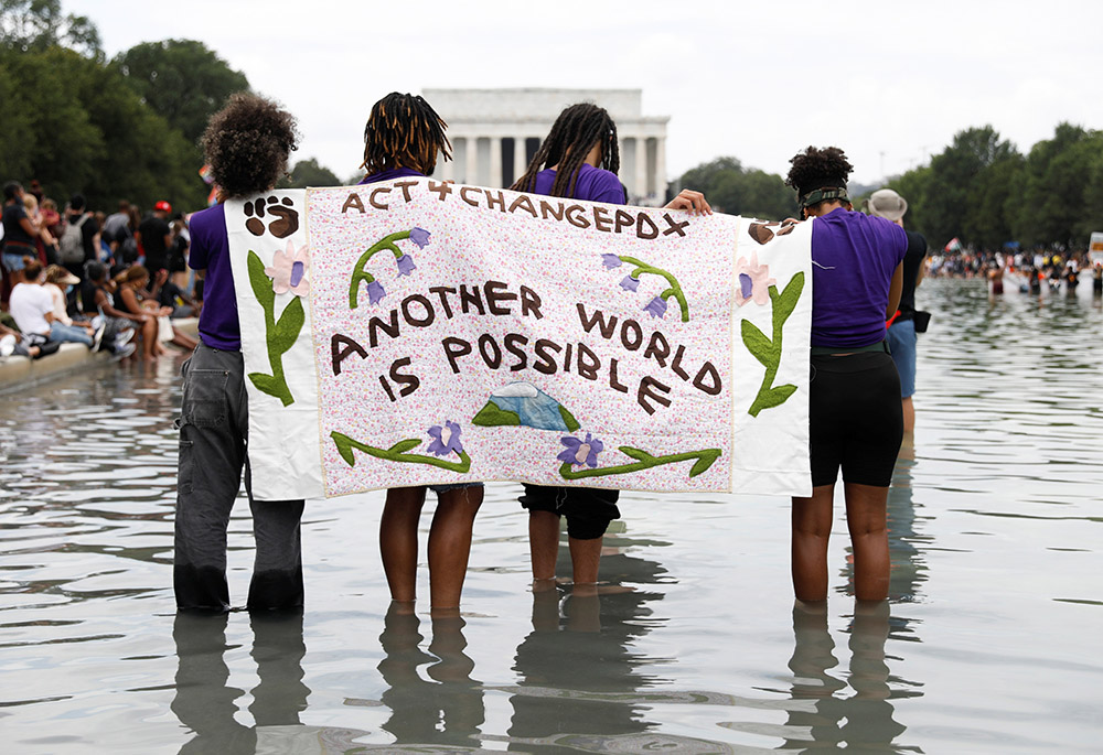 Demonstrators gather in front of the Lincoln Memorial for the Aug. 28, 2020, "Get Your Knee Off Our Necks" March on Washington 2020 in support of racial justice. (CNS/Reuters/Andrew Kelly)