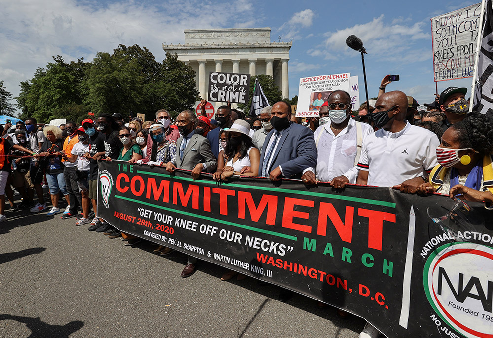 The Rev. Al Sharpton and Martin Luther King III, son of slain civil rights leader Rev. Martin Luther King Jr., his wife Arndrea Waters King and other leaders begin the "Get Your Knee Off Our Necks" Commitment March on Washington Aug. 28, 2020. (CNS) The Rev. Al Sharpton and Martin Luther King III, son of slain civil rights leader Rev. Martin Luther King Jr., his wife Arndrea Waters King and other leaders begin the "Get Your Knee Off Our Necks" Commitment March on Washington Aug. 28, 2020. (CNS)
