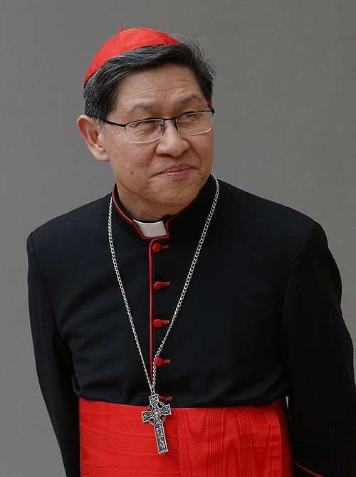 Cardinal Luis Antonio Tagle, prefect of the Congregation for the Evangelization of Peoples, is pictured in a 2018 file photo. (CNS/Paul Haring)