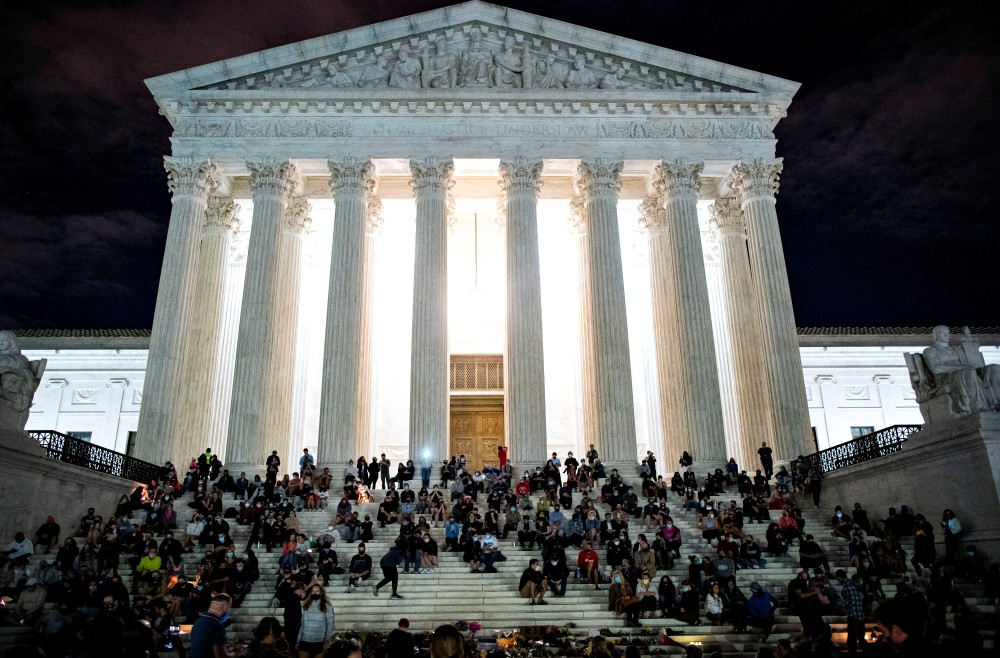 People in Washington gather in front of the U.S. Supreme Court following the death of U.S. Supreme Court Justice Ruth Bader Ginsburg Sept. 18. (CNS/Reuters/Al Drago) People in Washington gather in front of the U.S. Supreme Court following the death of U.S. Supreme Court Justice Ruth Bader Ginsburg Sept. 18. (CNS/Reuters/Al Drago)