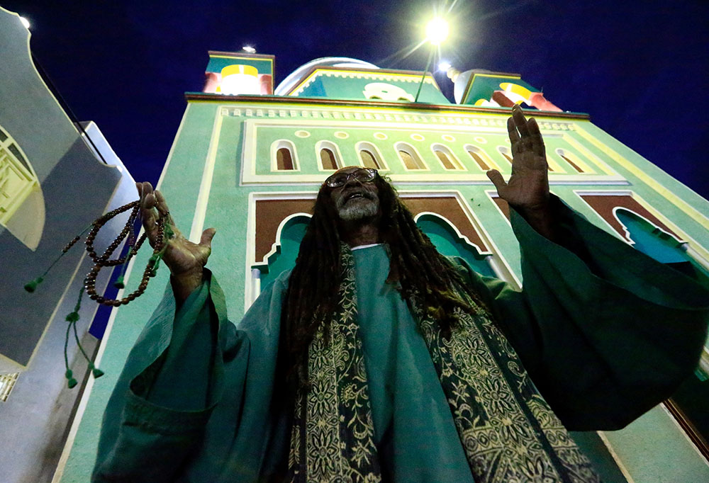 A Muslim man is pictured in a file photo praying outside a mosque in Khartoum, Sudan. (CNS/Reuters/Mohamed Nureldin Abdallah) A Muslim man is pictured in a file photo praying outside a mosque in Khartoum, Sudan. (CNS/Reuters/Mohamed Nureldin Abdallah)