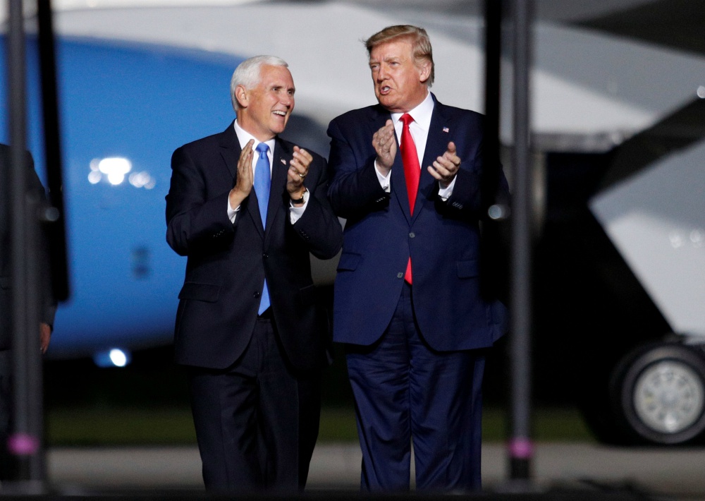 President Donald Trump and Vice President Mike Pence arrive at a campaign rally in Newport News, Virginia, Sept. 25. (CNS/Reuters/Tom Brenner)