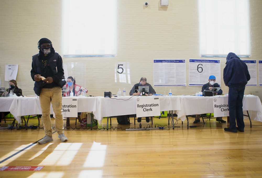 People check in to vote during the presidential election at Ida B. Wells Middle School in Washington Nov. 3. (CNS/Tyler Orsburn)