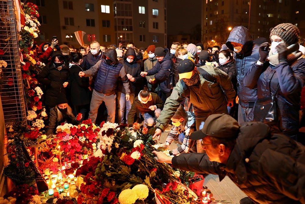 People gather to mourn the death of anti-government protester Raman Bandarenko Nov. 12 in Minsk, Belarus. (CNS/BelaPAN via Reuters)