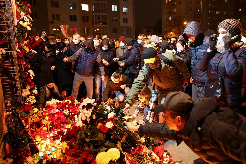 People gather to mourn the death of anti-government protester Raman Bandarenko Nov. 12 in Minsk, Belarus. (CNS/BelaPAN via Reuters) People gather to mourn the death of anti-government protester Raman Bandarenko Nov. 12 in Minsk, Belarus. (CNS/BelaPAN via Reuters)