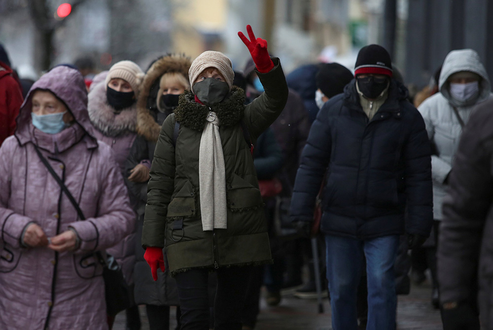 People take part in an opposition rally to demand the resignation of Belarusian President Alexander Lukashenko and to protest against police violence Nov. 30 in Minsk, Belarus. The Catholic bishops in Belarus said the country's "unprecedented socio-politi