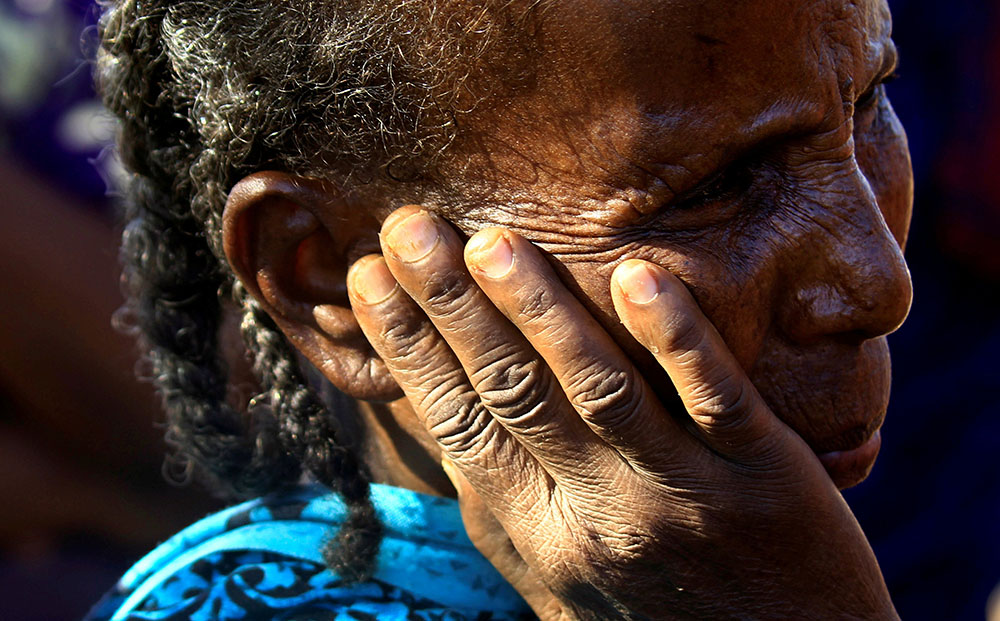 An Ethiopian woman who fled fighting in the Tigray region is seen at the Um-Rakoba refugee camp on the Sudan-Ethiopia border Dec. 13, 2020. (CNS/Reuters/Mohamed Nureldin Abdallah)