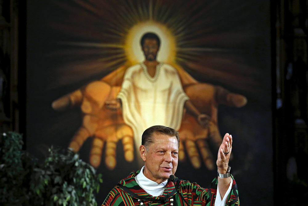 Fr. Michael Pfleger, pastor of St. Sabina Church in Chicago, is seen in this 2015 file photo. Cardinal Blase Cupich of Chicago asked the priest to step aside from ministry Jan. 5, after the Archdiocese of Chicago received an allegation he sexually abused 