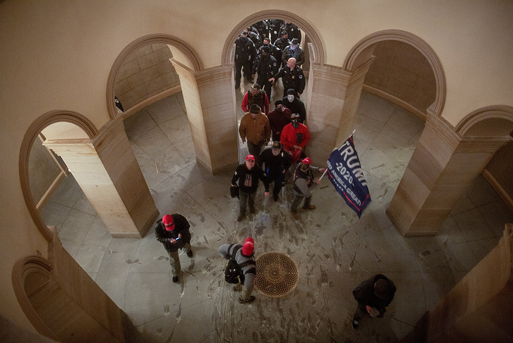 Supporters of President Donald Trump storm the U.S. Capitol in Washington Jan. 6, after a rally to contest the certification of the 2020 presidential election. (CNS/Ahmed Gaber, Reuters) Supporters of President Donald Trump storm the U.S. Capitol in Washington Jan. 6, after a rally to contest the certification of the 2020 presidential election. (CNS/Ahmed Gaber, Reuters)
