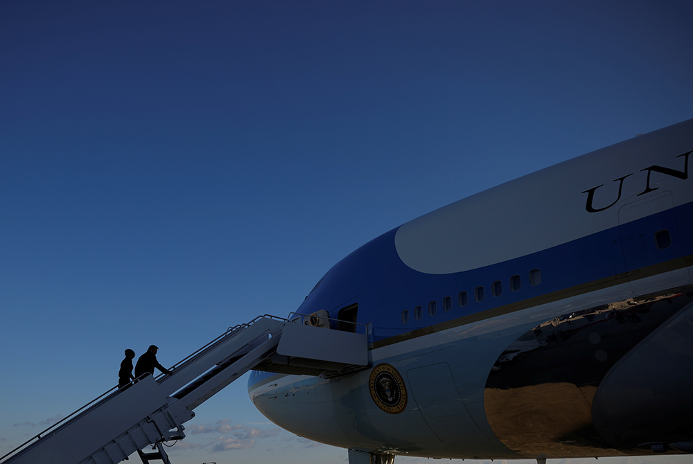 Then-President Donald Trump and first lady Melania Trump depart Joint Base Andrews in Maryland Jan. 20, ahead of then-President-elect Joe Biden's inauguration. (CNS/Carlos Barria, Reuters)