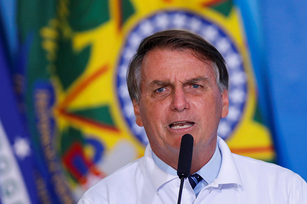 Brazilian President Jair Bolsonaro speaks during a ceremony at the presidential palace in Brasília Jan. 12, 2021. (CNS/Reuters/Adriano Machado)