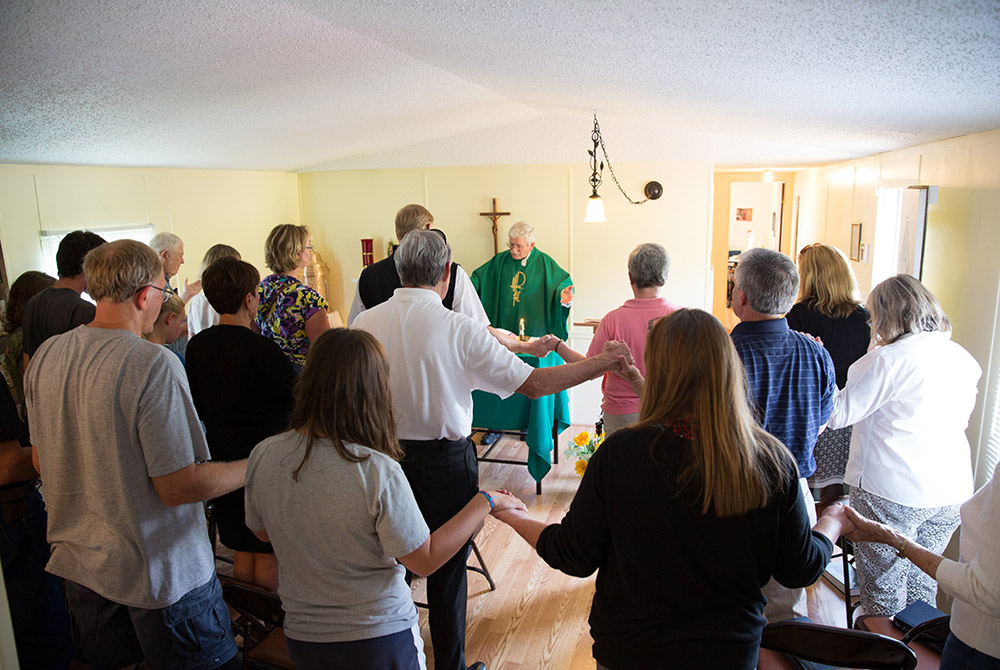 In this 2013 file photo, Mass is celebrated at St. Luke's Church in Salyersville, Kentucky, a parish in the Diocese of Lexington that is supported by Catholic Extension. The majority of the counties within the diocese are rural and in mountain areas where