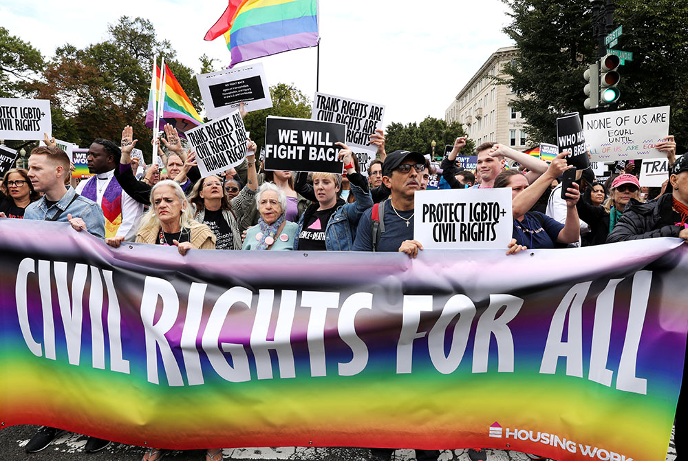 LGBTQ activists are seen outside the Supreme Court Oct. 8, 2019, in Washington. (CNS/Jonathan Ernst, Reuters) LGBTQ activists are seen outside the Supreme Court Oct. 8, 2019, in Washington. (CNS/Jonathan Ernst, Reuters)