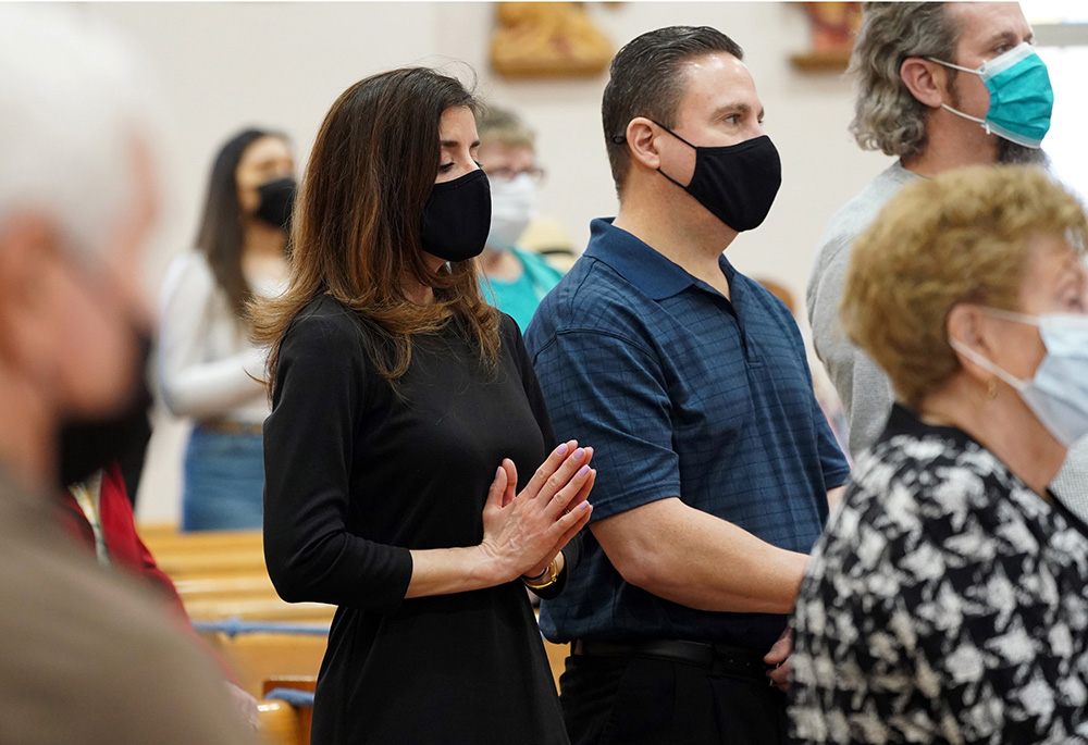 Worshippers attend Easter Mass April 4, 2021, at St. Peter the Apostle Church in Islip Terrace, New York. (CNS/Gregory A. Shemitz) Worshippers attend Easter Mass April 4, 2021, at St. Peter the Apostle Church in Islip Terrace, New York. (CNS/Gregory A. Shemitz)