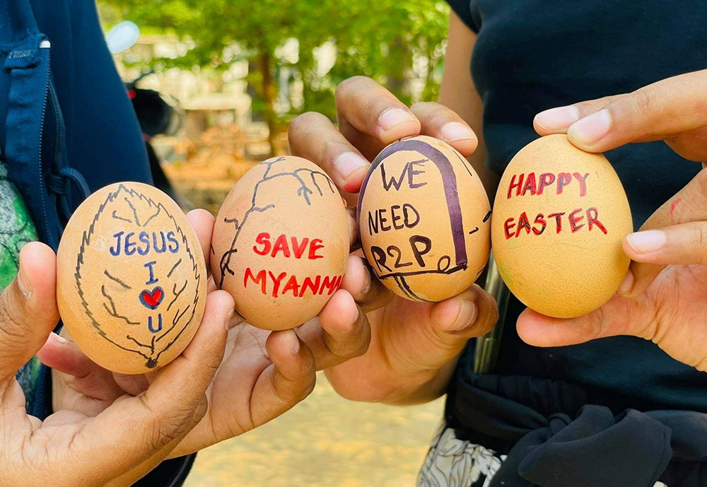 Easter eggs painted with slogans from the protests against the military coup are displayed in Mandalay, Myanmar, April 3. (CNS/Social media via Reuters) Easter eggs painted with slogans from the protests against the military coup are displayed in Mandalay, Myanmar, April 3. (CNS/Social media via Reuters)