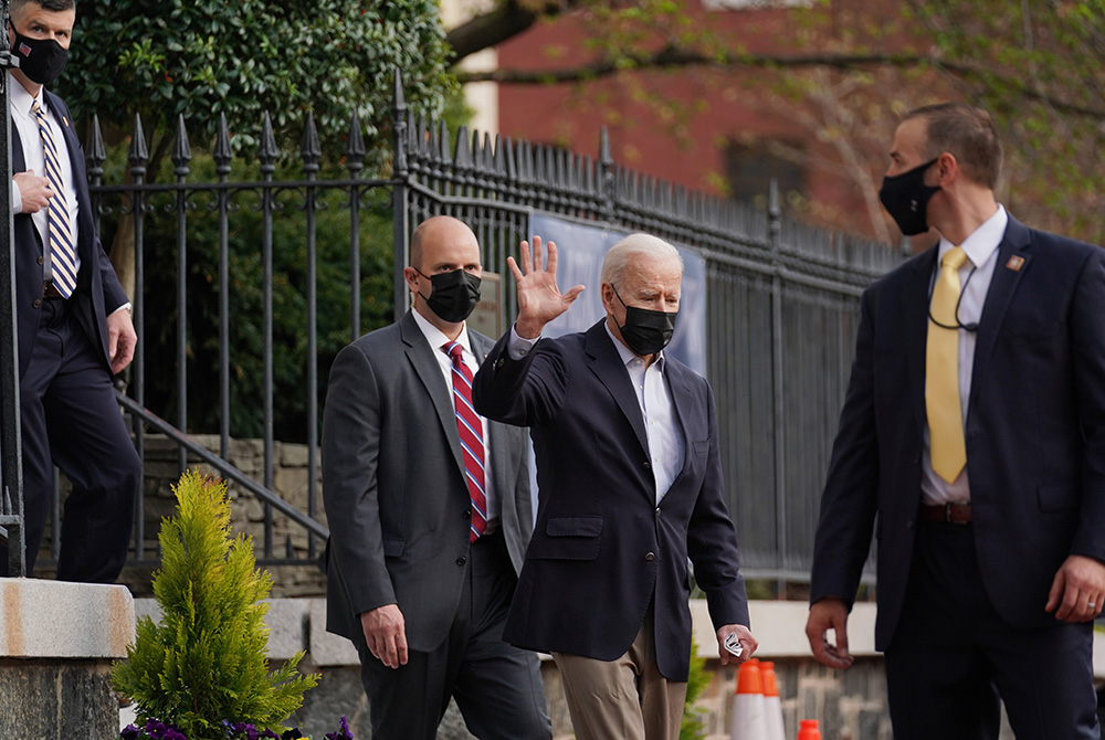 President Joe Biden waves as he departs Holy Trinity Catholic Church April 10 in Washington. (CNS/Erin Scott, Reuters) President Joe Biden waves as he departs Holy Trinity Catholic Church April 10 in Washington. (CNS/Erin Scott, Reuters)