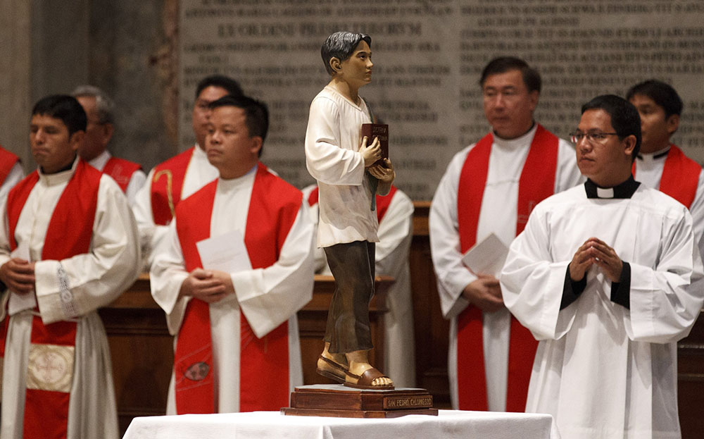 A statue of St. Pedro Calungsod, a lay catechist from the Philippines who was martyred in Guam in 1672, is seen during a Mass of thanksgiving for his canonization, in St. Peter's Basilica at the Vatican Oct. 22, 2012. (CNS/Paul Haring)