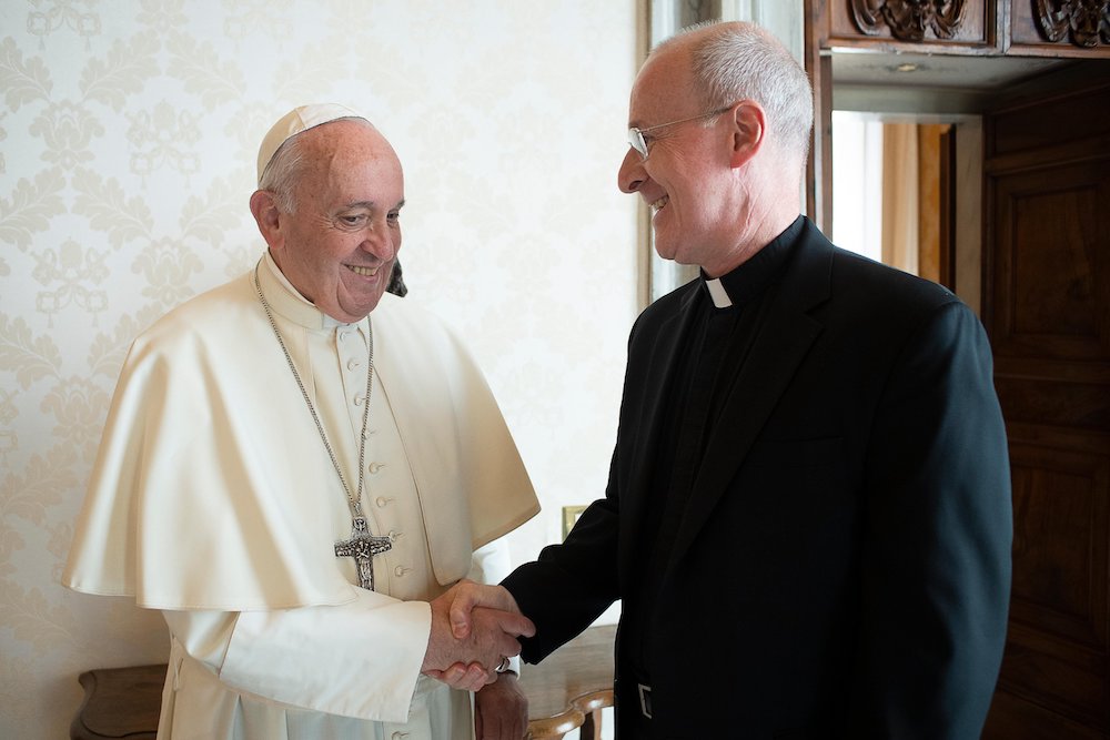 Pope Francis greets Jesuit Fr. James Martin, author and editor at large of America magazine, during a private meeting at the Vatican in this Oct. 1, 2019, file photo. Martin released a recent handwritten letter from the pope that commended his LGBT minist