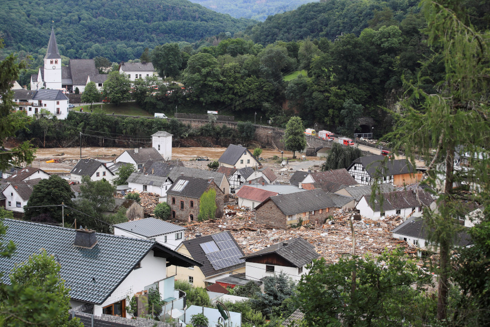 Debris surrounds homes following flooding in Schuld, Germany, July 15, 2021. Pope Francis offered prayers and expressed his closeness to the people of Germany after severe flooding in the western part of the country claimed more than 80 lives. (CNS photo)
