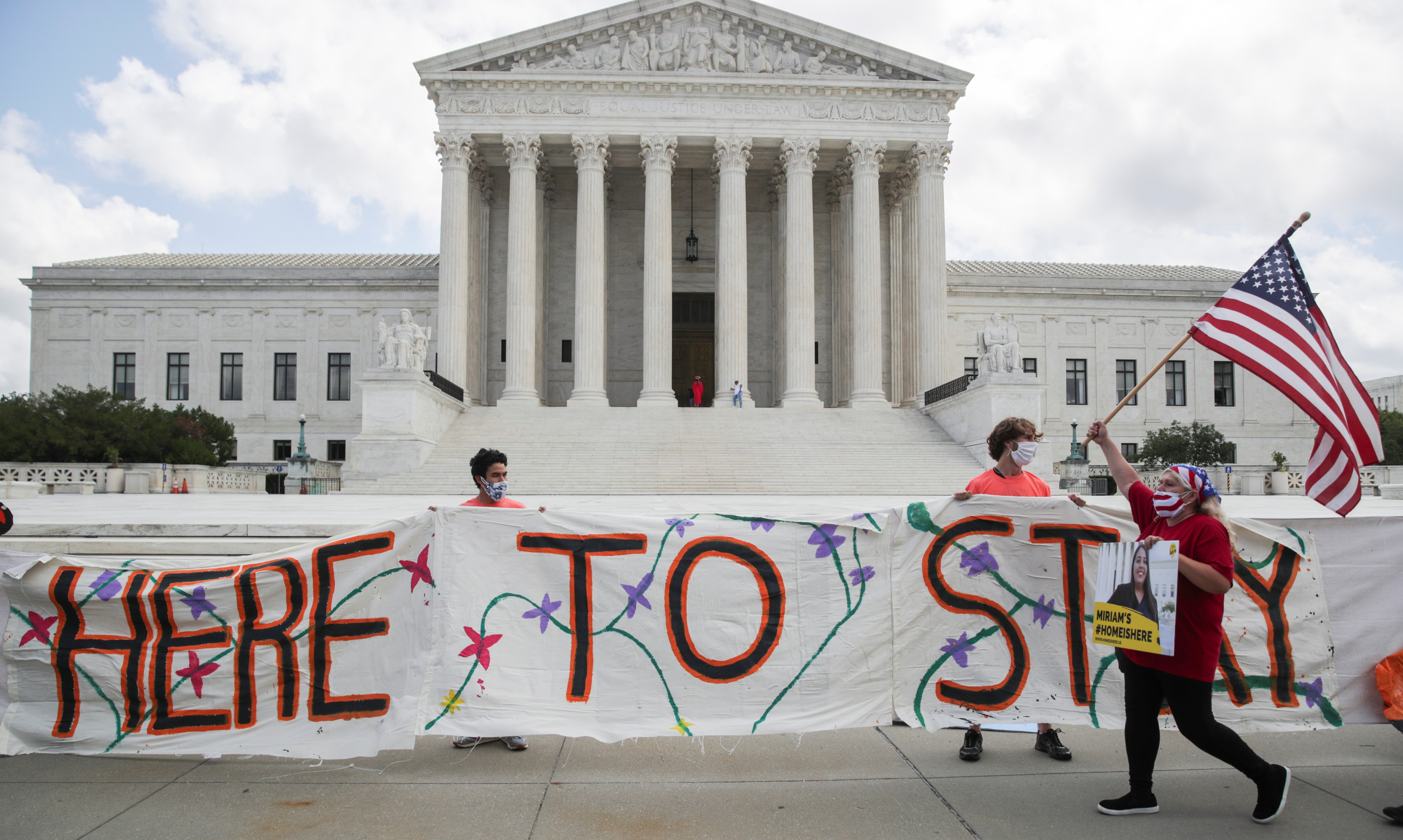 Beneficiaries of the Deferred Action for Childhood Arrivals program and their supporters celebrate outside the U.S. Supreme Court in Washington June 18, 2020, after the high court upheld DACA in a challenge brought by the Trump administration. Judge Andre