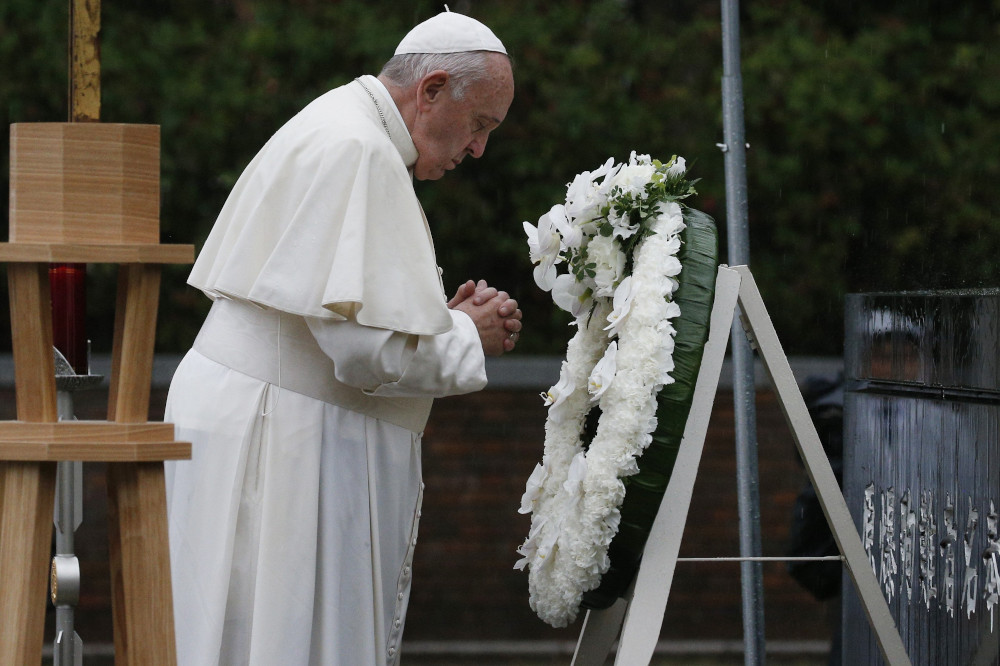 Pope Francis prays as he visits the Atomic Bomb Hypocenter Park in Nagasaki, Japan, Nov. 24, 2019. (CNS/Paul Haring)