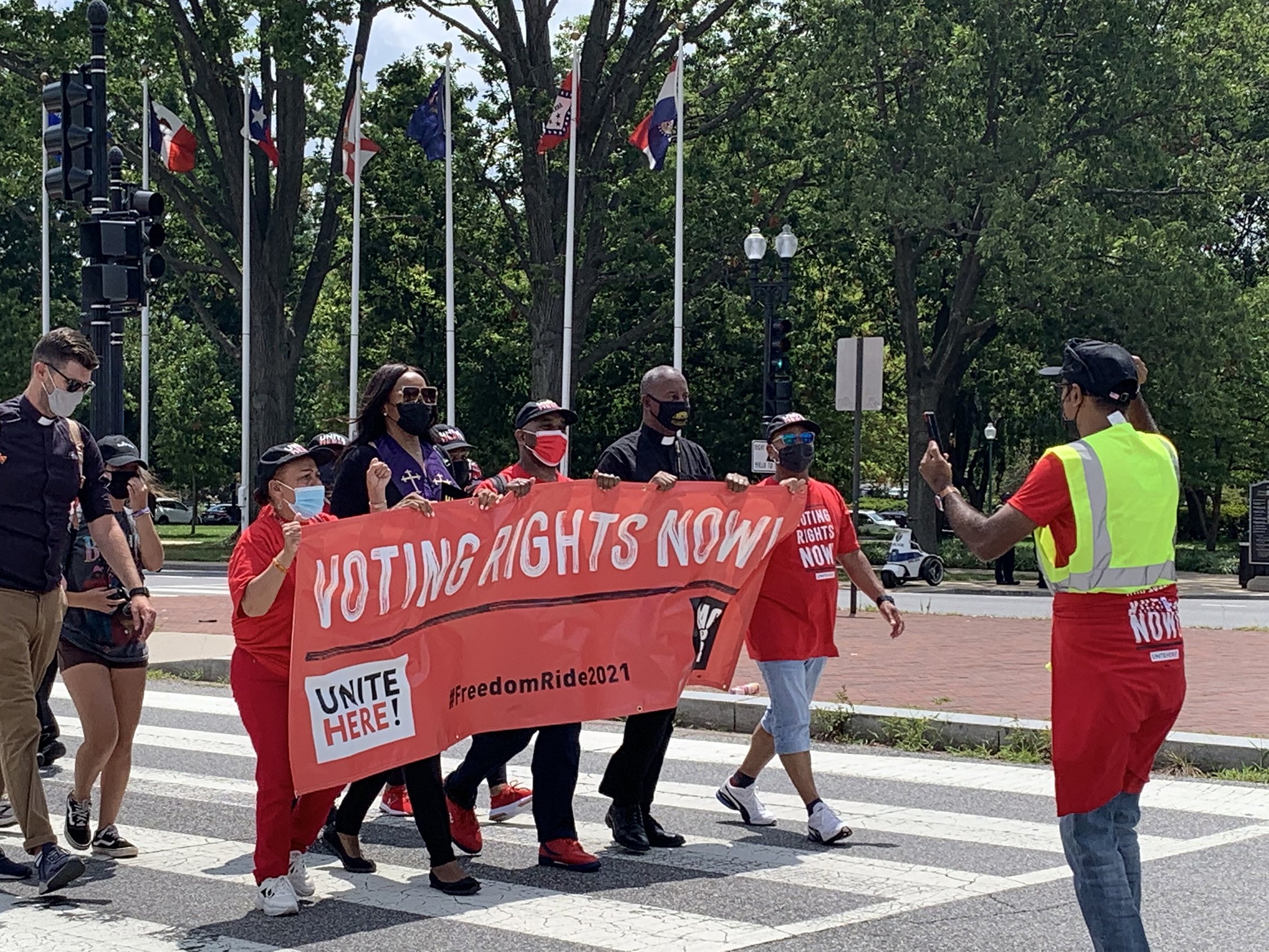 Men and women from different religious groups march toward the U.S. Capitol in Washington Aug. 2, 2021, during a protest for voting rights and economic justice organized by the Poor People's Campaign: A National Call for Moral Revival. (CNS photo/Melissa 