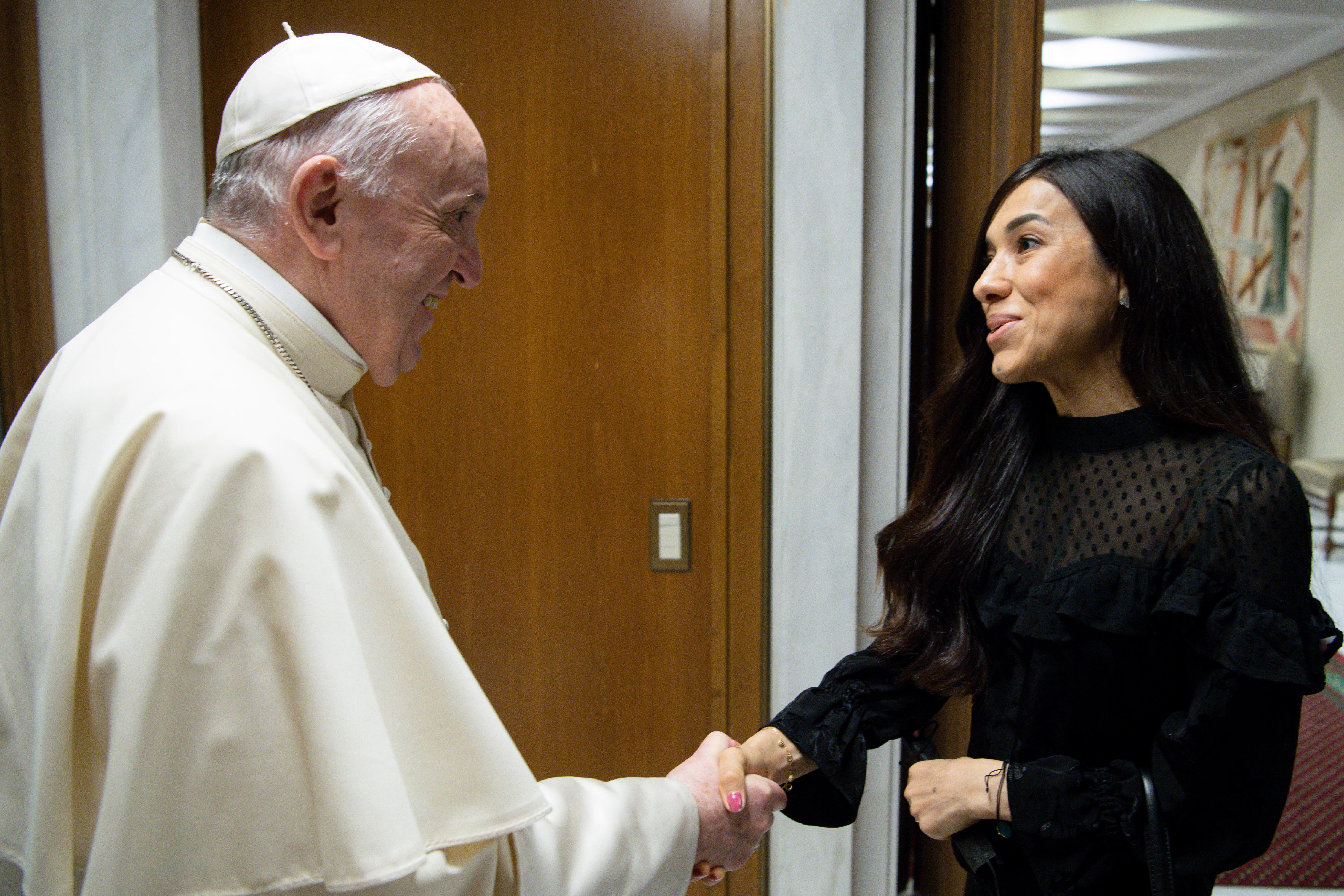 Pope Francis meets with Nobel Peace Prize laureate Nadia Murad during a private meeting at the Vatican Aug. 26, 2021. Murad was kidnapped by Islamic State militants in Iraq in 2014 during a genocidal campaign against the Yazidi people. (CNS photo/Vatican 