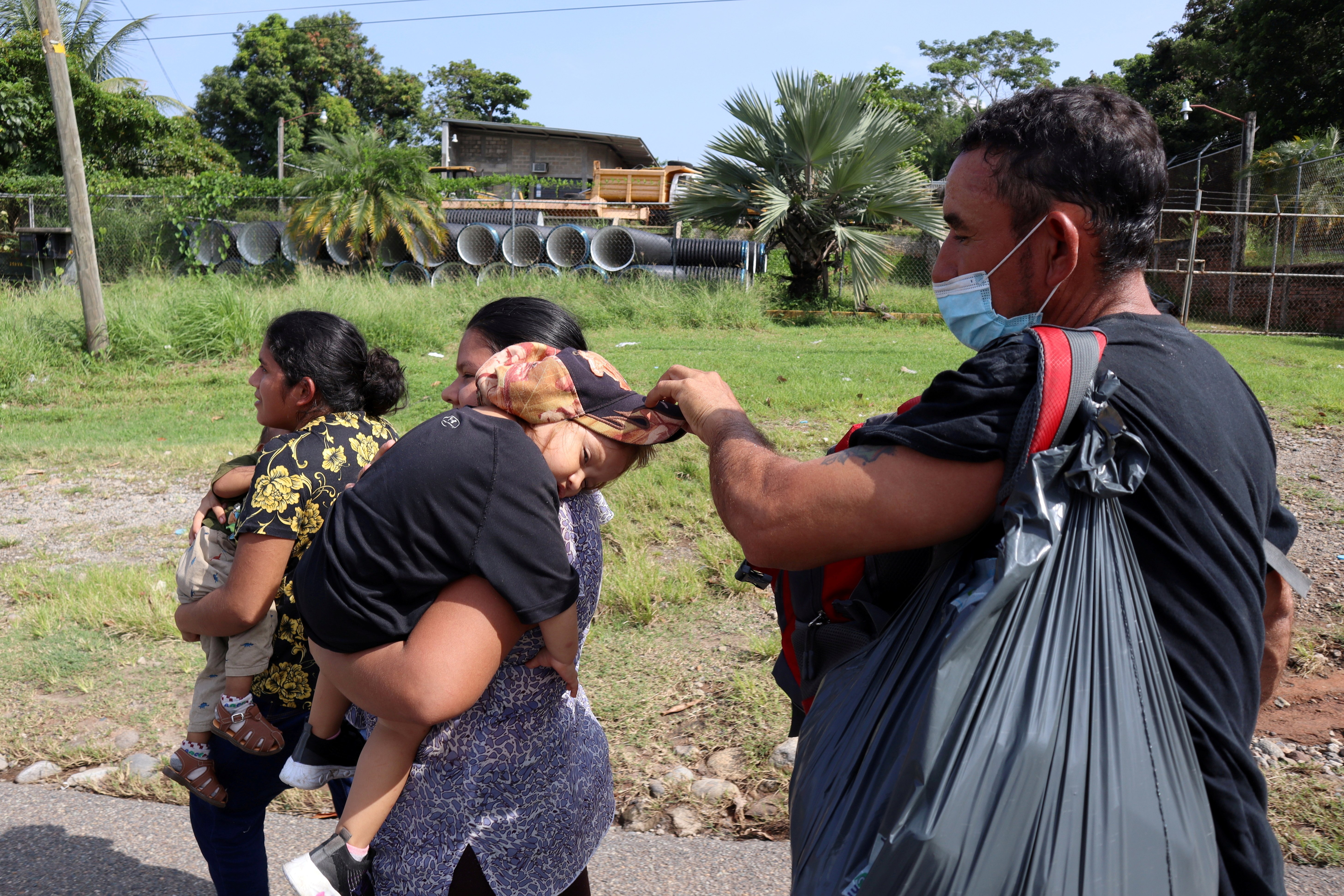 Migrants and asylum-seekers from Central America and the Caribbean walk in a caravan in Tapachula, Mexico, Aug. 28, 2021. They are headed to the Mexican capital to apply for asylum and refugee status. (CNS photo/Jose Torres, Reuters)