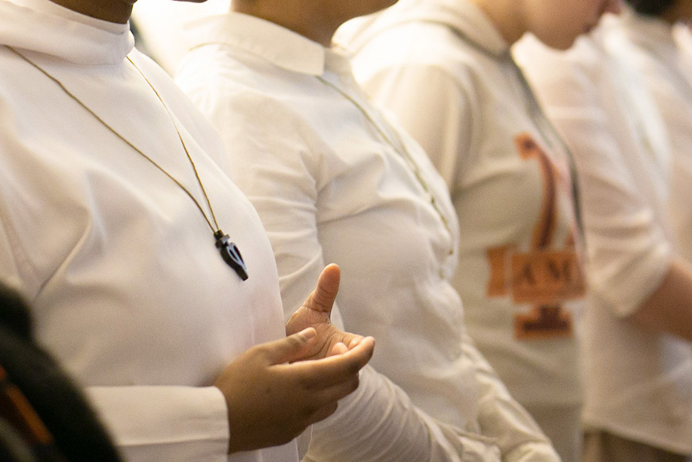 Members of the Famille Marie-Jeunesse are pictured during Mass in Notre-Dame-de-Foy's Church in Quebec City Jan. 31, 2017. (CNS/Présence/Philippe Vaillancourt)