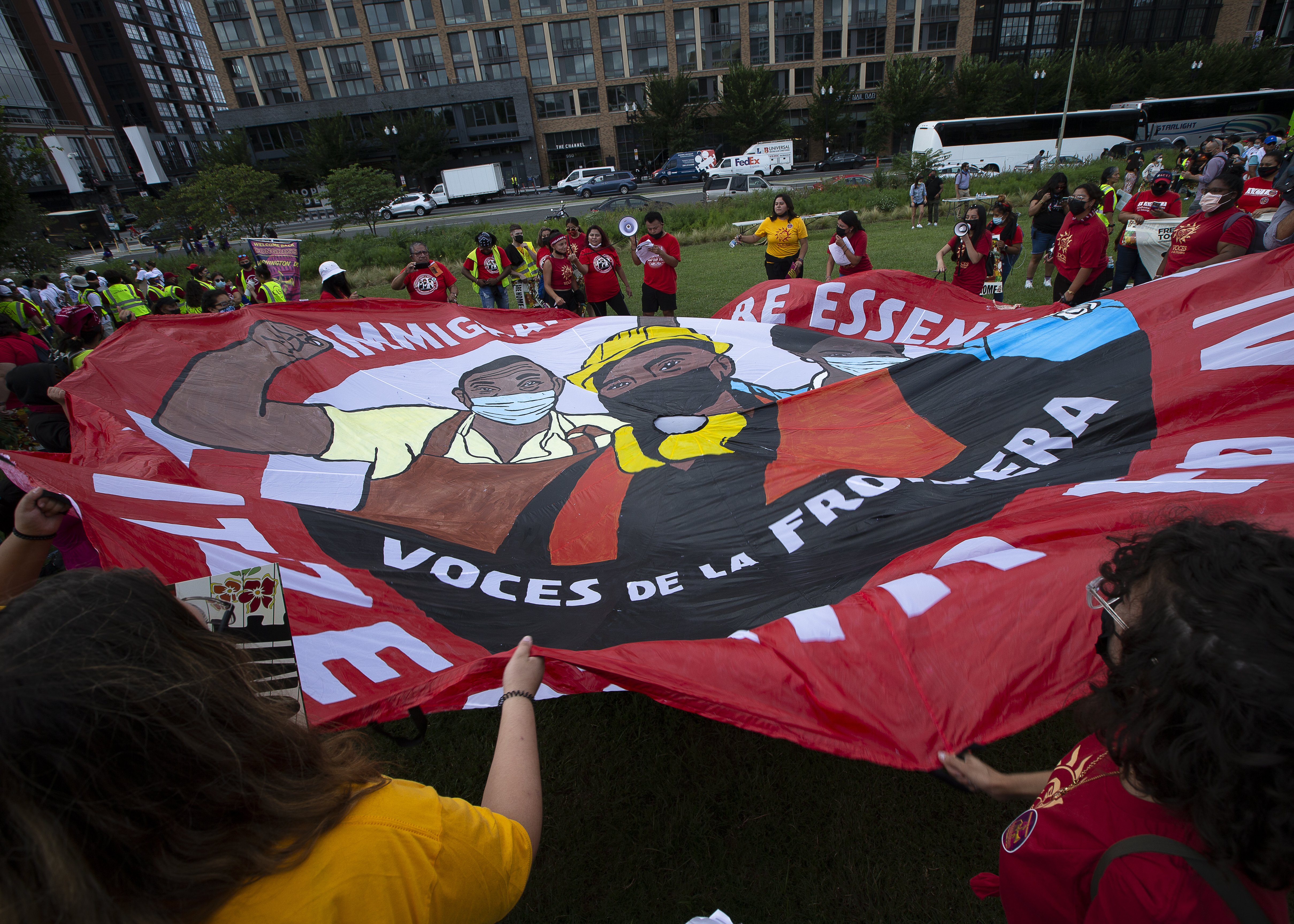Migrant families and immigration advocates in Washington call for a pathway toward U.S. citizenship as they gather near Benjamin Banneker Park to march toward the U.S. Immigration and Customs Enforcement building Sept. 21, 2021. (CNS photo/Tyler Orsburn)