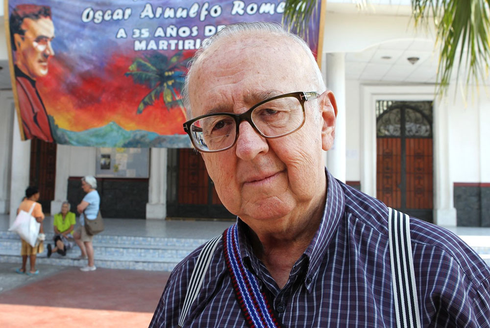 Fr. Pablo Richard Guzman stands in front of St. Anthony Catholic Church May 22, 2015, in Soyapango, El Salvador. Guzman, one of the fathers of liberation theology, died in Costa Rica Sept. 20, at age 81. (CNS/Chaz Muth)