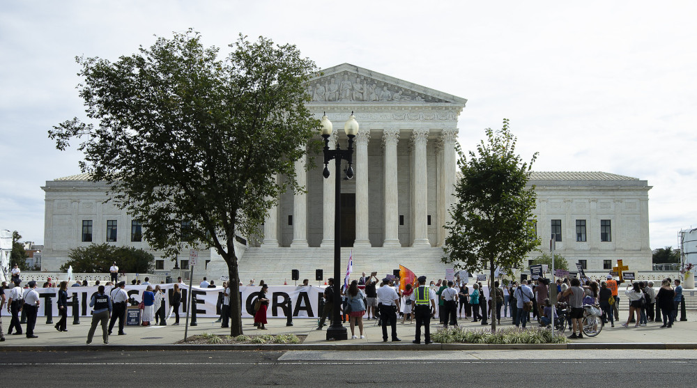 Pro-life advocates and supporters of legal abortion are seen near the U.S. Supreme Court building in Washington on Oct. 4. (CNS/Tyler Orsburn)