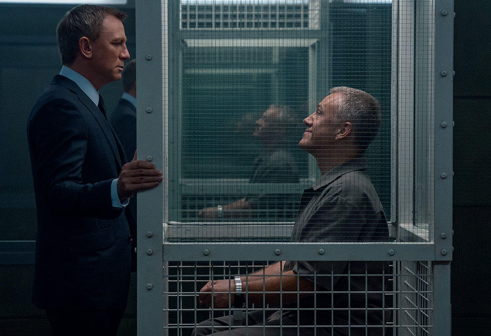 Daniel Craig and Christoph Waltz star in a scene from the movie "No Time to Die." (CNS/MGM/Nicola Dove)