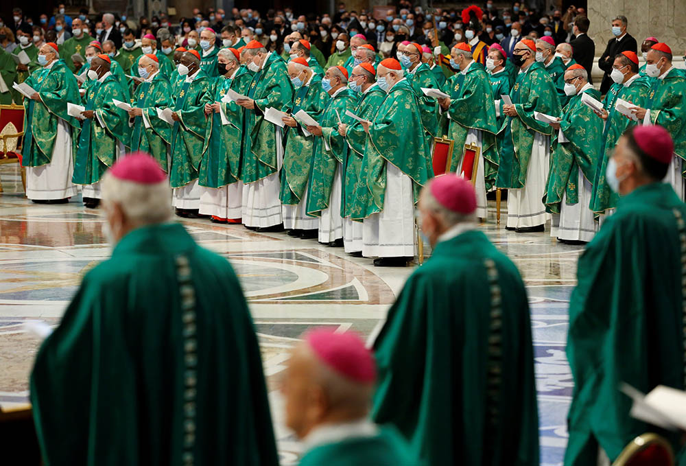 Cardinals and bishops attend Pope Francis' celebration of a Mass to open the process that will lead up to the assembly of the world Synod of Bishops in 2023, in St. Peter's Basilica at the Vatican Oct. 10, 2021. (CNS/Reuters/Remo Casilli)