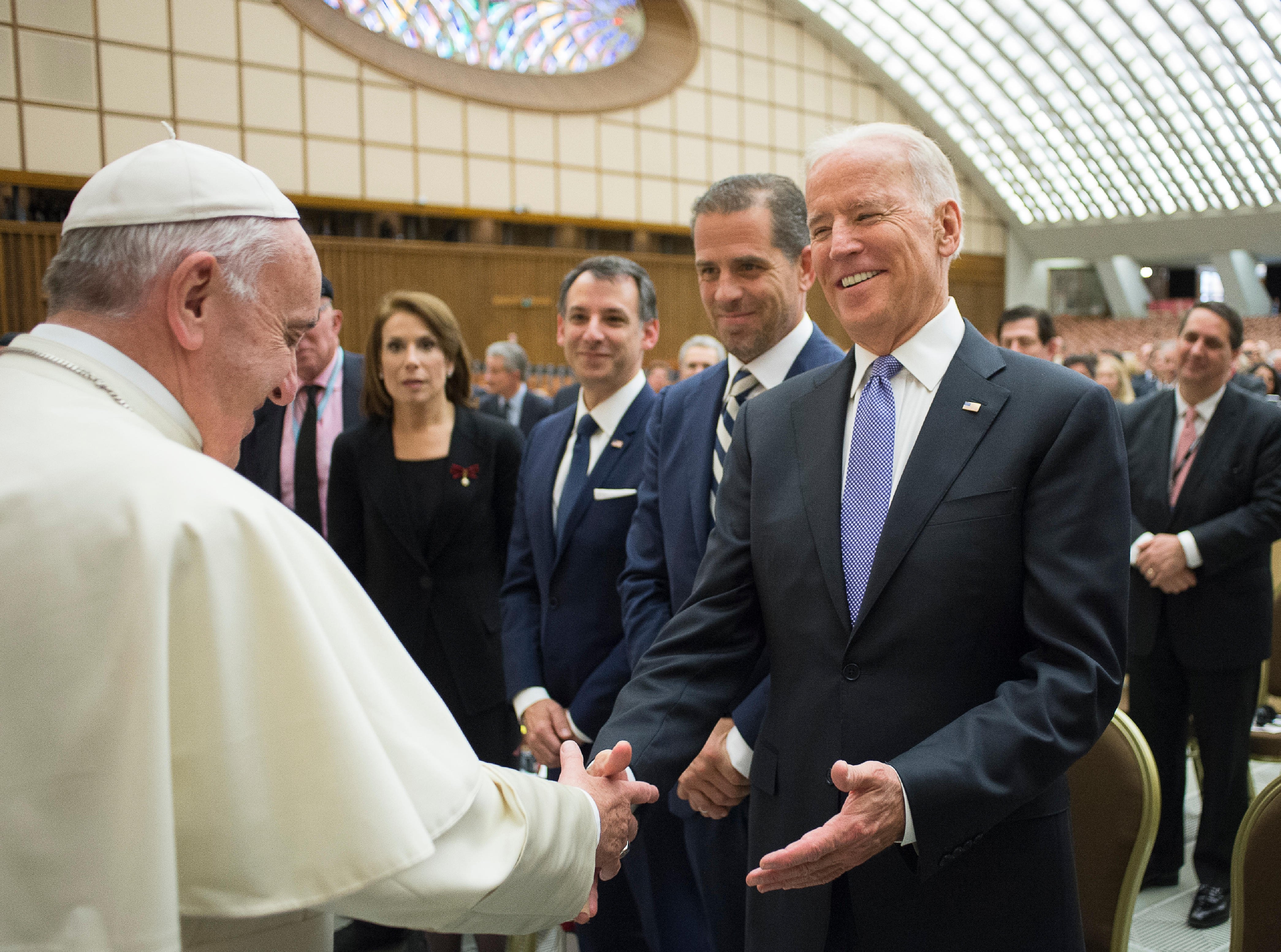 Pope Francis greets then-U.S. Vice President Joe Biden after both spoke at a conference on adult stem cell research at the Vatican April 29, 2016. In a recent interview, Archbishop Christophe Pierre, the Vatican ambassador to the U.S., said he is helping 