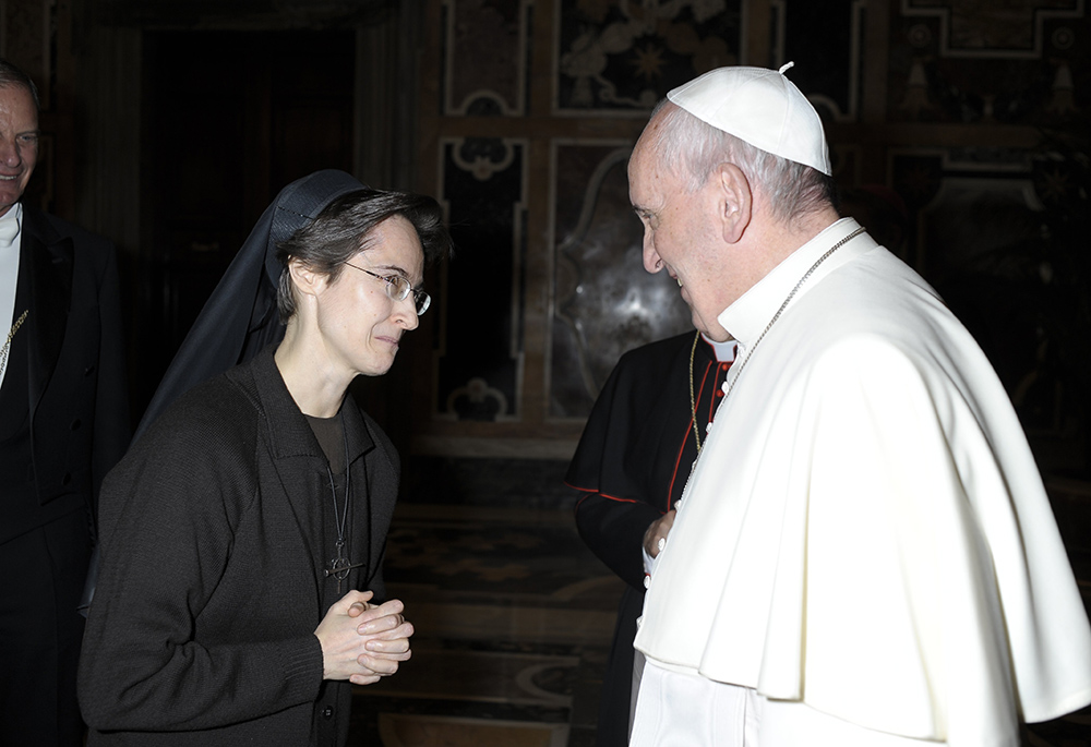 Pope Francis greets Sr. Raffaella Petrini, an Italian member of the U.S.-based Franciscan Sisters of the Eucharist, Dec. 3, 2015, at the Vatican. (CNS/Vatican Media)