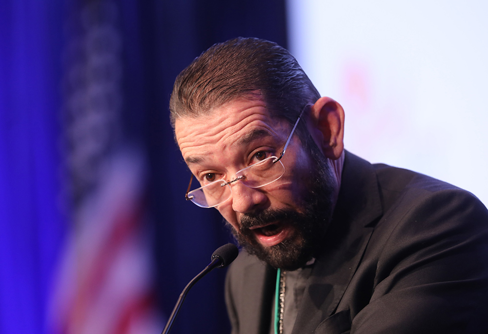 Bishop Daniel Flores of Brownsville, Texas, speaks during a Nov. 17, 2021, session of the fall general assembly of the U.S. Conference of Catholic Bishops in Baltimore. (CNS/Bob Roller)