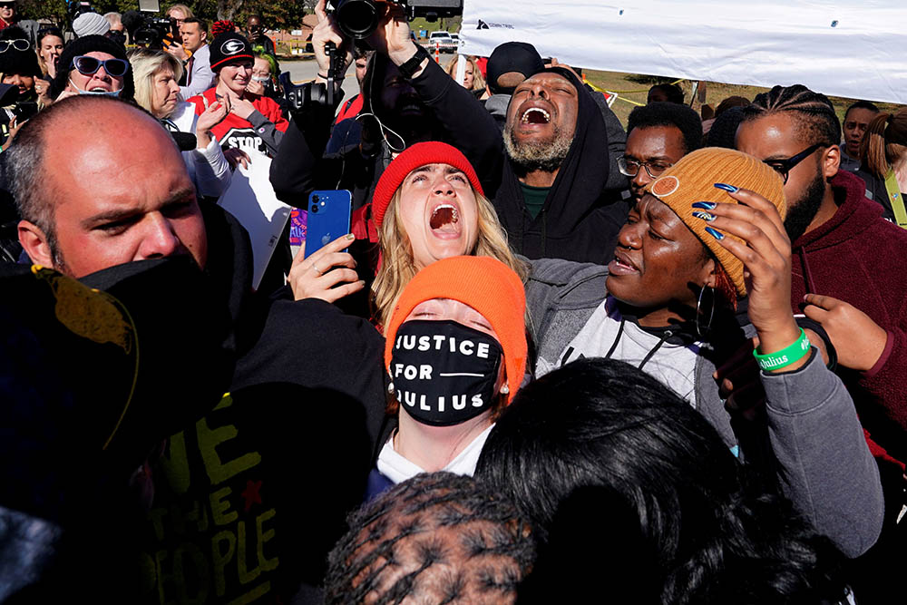 Demonstrators in McAlester, Oklahoma, rejoice after Gov. Kevin Stitt granted clemency for Julius Jones Nov. 18, just hours before he was scheduled to be executed. (CNS/Reuters/Nick Oxford)