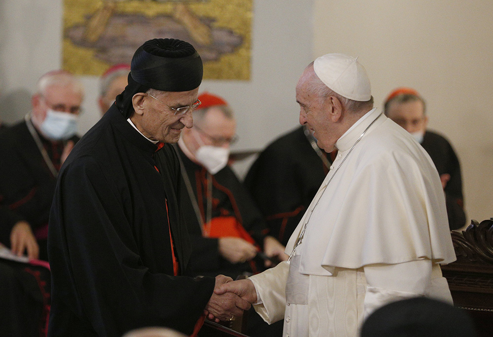Cardinal Bechara Rai greets Pope Francis as the pope arrives to lead a meeting with priests, religious, deacons, catechists and members of church groups and movements at the Maronite Cathedral of Our Lady of Grace Dec. 2, 2021, in Nicosia, Cyprus. (CNS) Cardinal Bechara Rai greets Pope Francis as the pope arrives to lead a meeting with priests, religious, deacons, catechists and members of church groups and movements at the Maronite Cathedral of Our Lady of Grace Dec. 2, 2021, in Nicosia, Cyprus. (CNS)