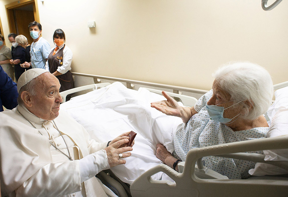Pope Francis gives a rosary to a patient at Gemelli hospital July 11 in Rome, as he recovers following scheduled colon surgery. The pope was in the hospital for 10 days. (CNS/Vatican Media via Reuters) Pope Francis gives a rosary to a patient at Gemelli hospital July 11 in Rome, as he recovers following scheduled colon surgery. The pope was in the hospital for 10 days. (CNS/Vatican Media via Reuters)
